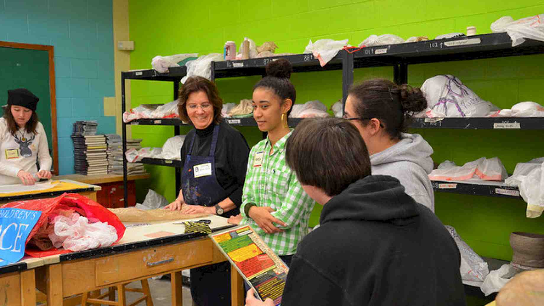 Art education faculty member, Michelle Tillander working with local high school students during a field experience