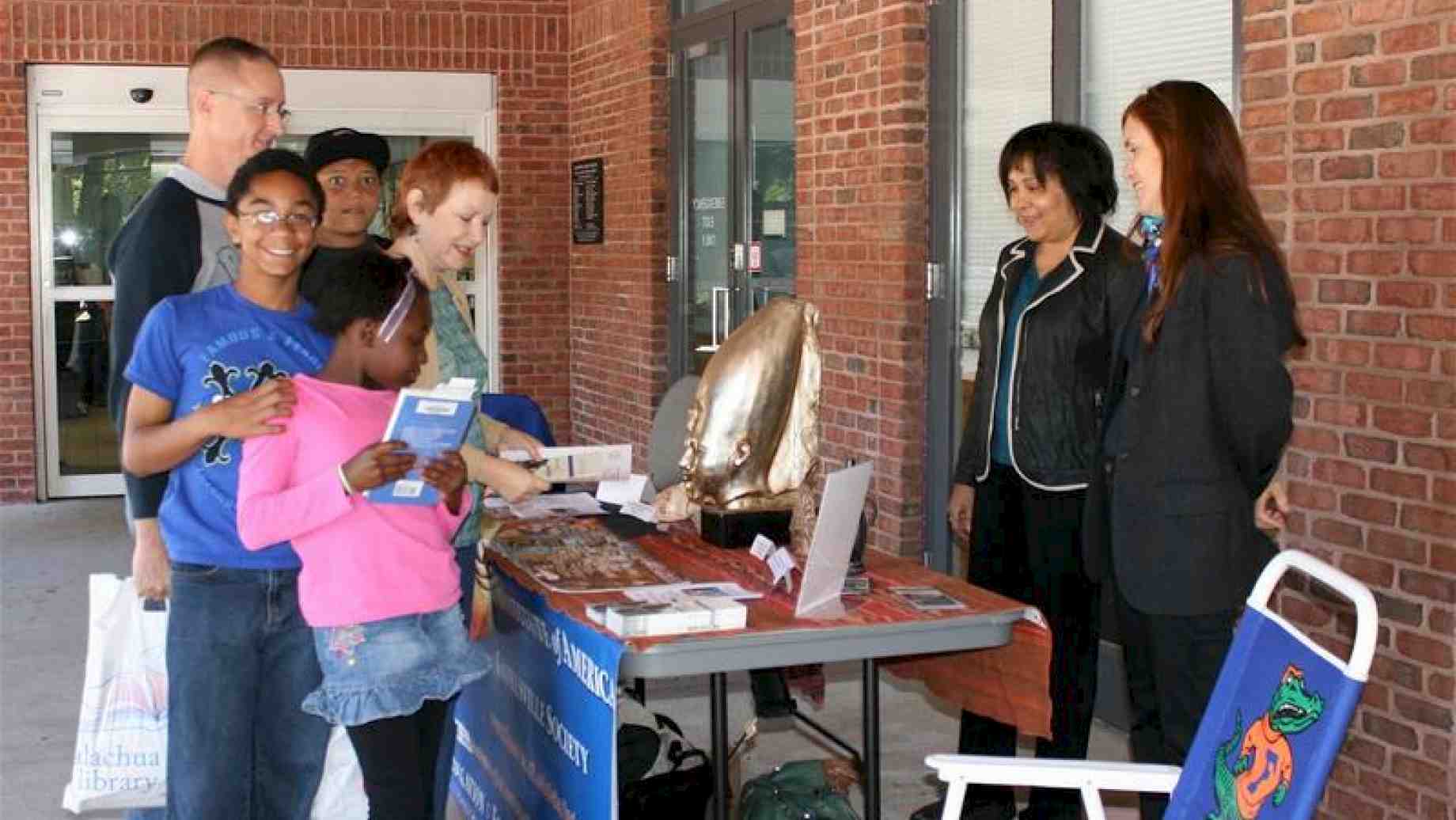 Dr Eaverly, Prof. of Classics & Affilliate Prof of Art History & Dr Stanfield-Mazzi at an Archeological Institute of America  event.