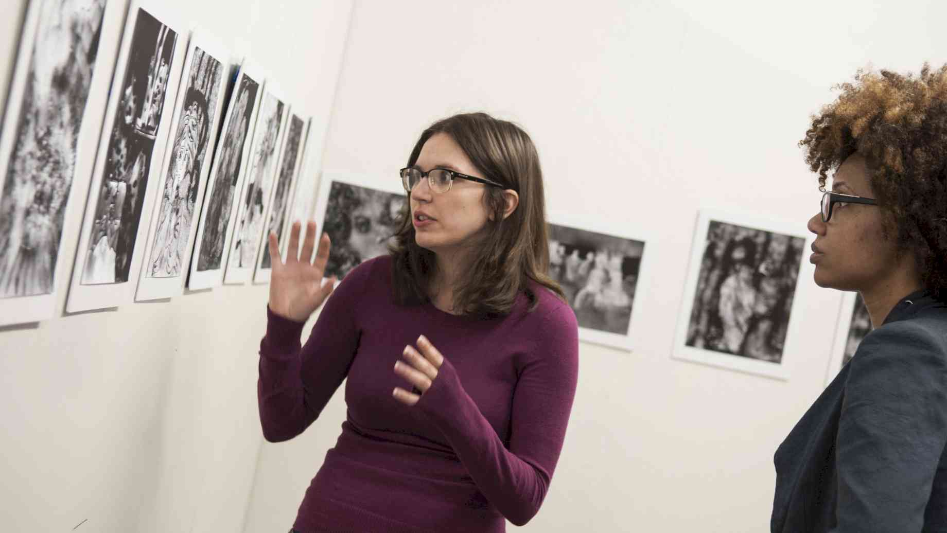 Visiting Artist LaToya Ruby Frazier conducting a studio visit with Creative Photography grad student Tori Bell